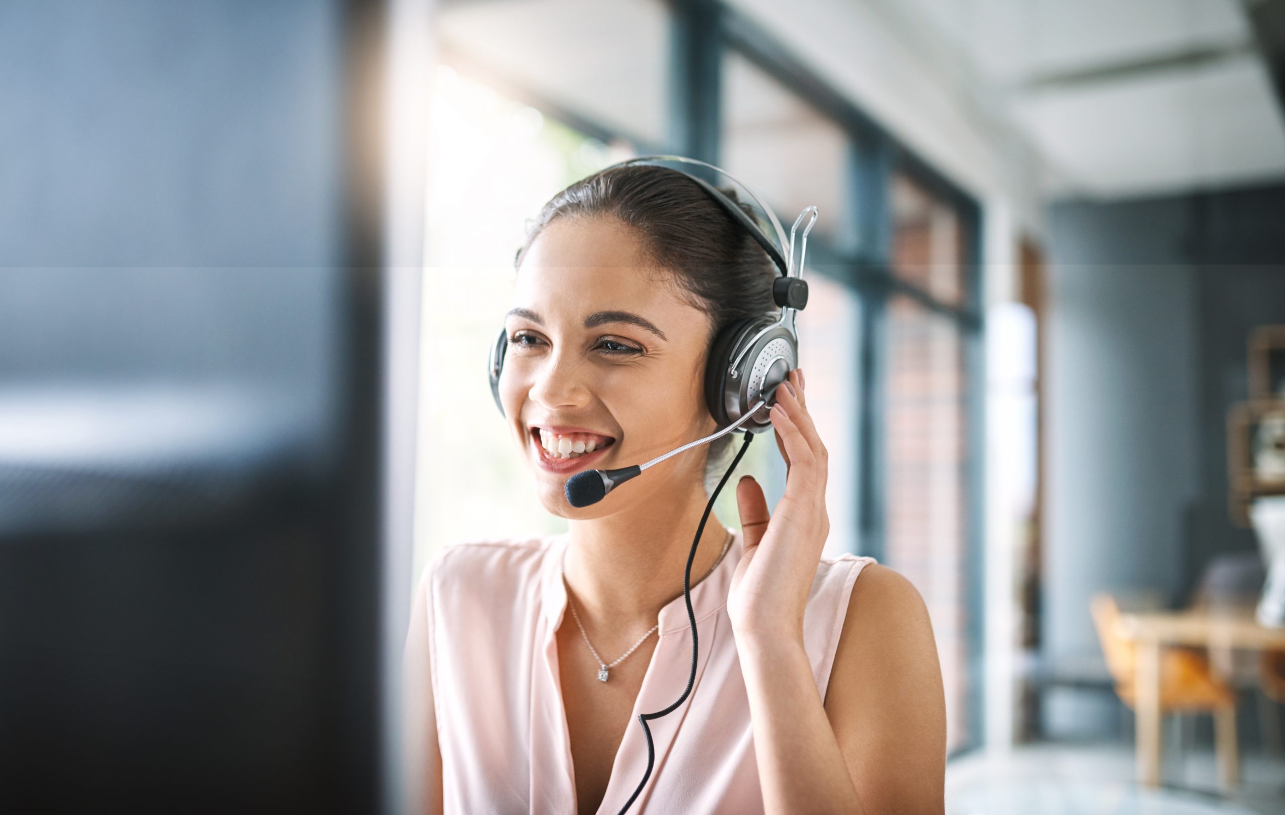 Helping others comes naturally lady talking on headset